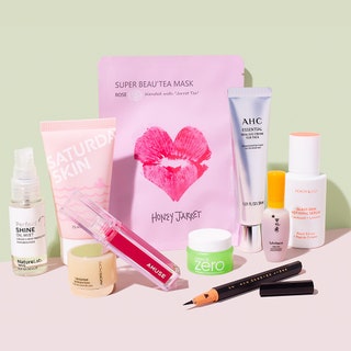 allure beauty box limited edition j and k beauty box on green pink background